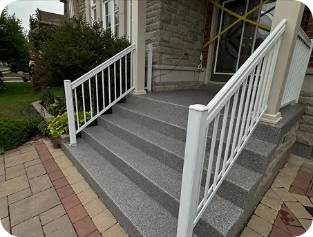 Front porch steps finished with grey speckled epoxy coating